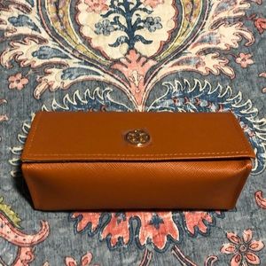 New Tory Burch glass case.